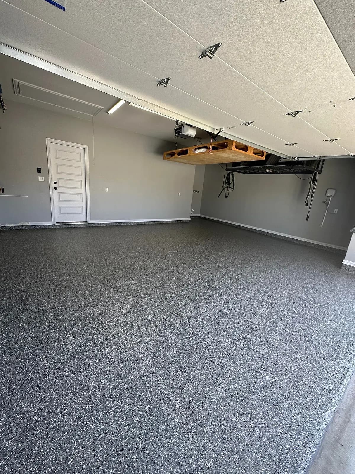 Finished flake garage floor looking toward the house door
